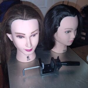 2 hair manikins and stand